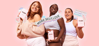 Three women holding VUSH vibrator boxes with stickers saying "I come first" and "more self love"