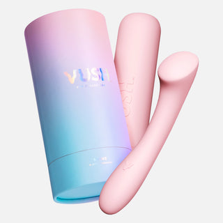 Blue/purple/pink gradient cylinder box packaging that reads "VUSH" next to pink case and pink Shine G Spot vibrator